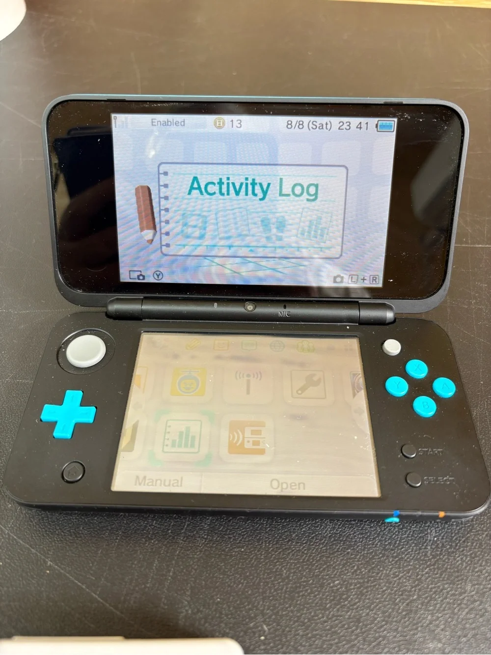 Nintendo 2DS XL Handheld Console - Black with Turquoise Buttons